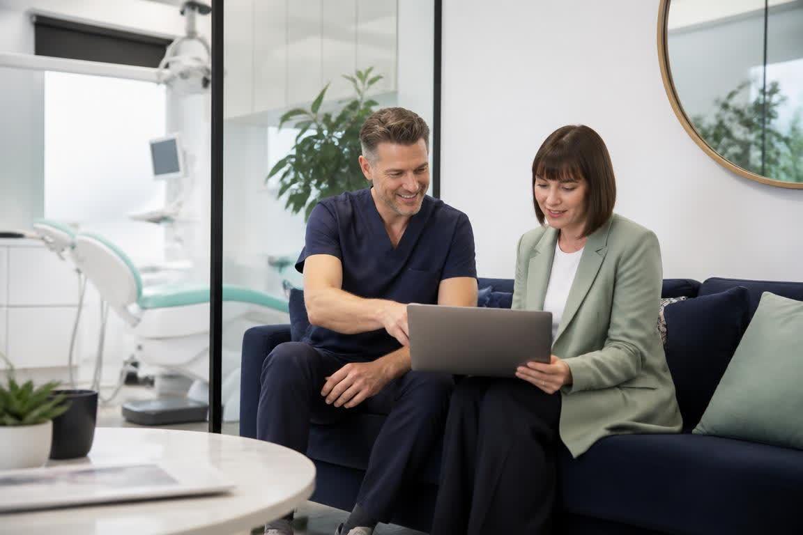 UK dentist and marketing strategist reviewing a clinic website and online booking journey